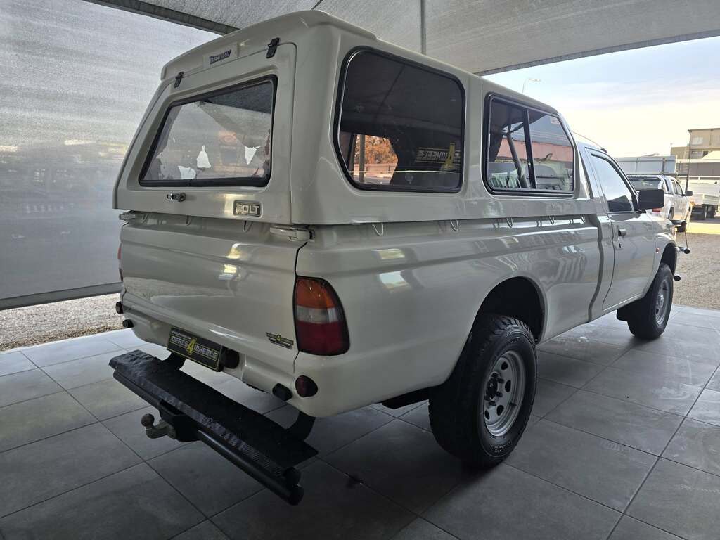 2000 MITSUBISHI COLT 2400i HILINE LWB P/U S/C