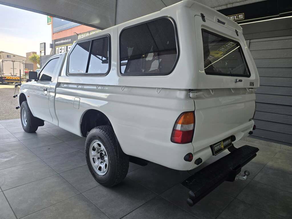 2000 MITSUBISHI COLT 2400i HILINE LWB P/U S/C